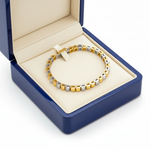 14k solid gold round cut diamond tennis bracelet with 0.85 cts tw, displayed in a royal blue jewelry box.