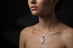 14k White Gold Hamsa Ice Green Diamond Necklace on Model