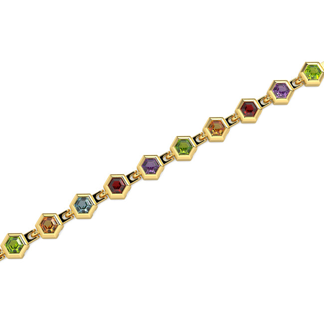 Gold bracelet with hexagonal gemstones on a white background