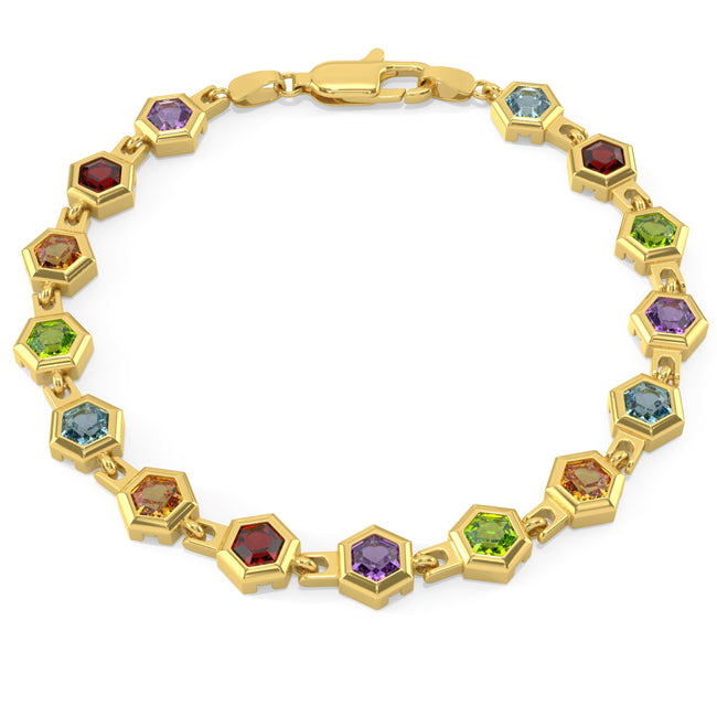 Gold bracelet with colorful gemstones on a white background