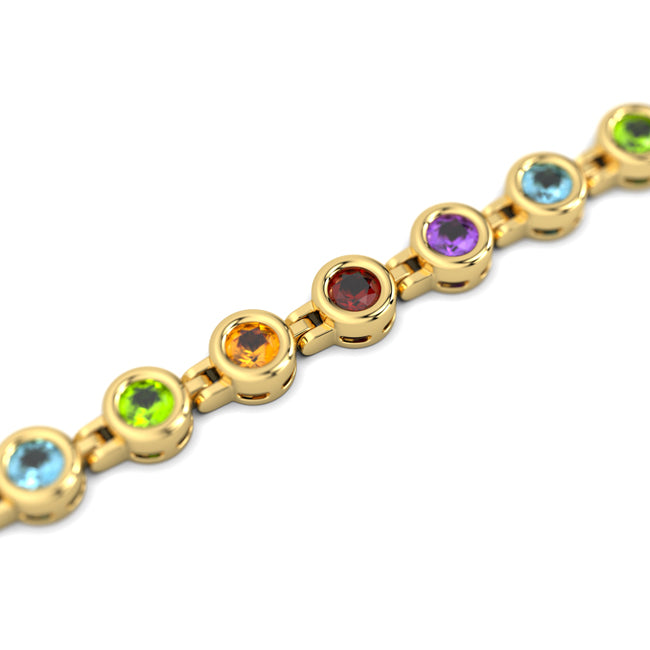 Gold bracelet with multicolored gemstones on a white background