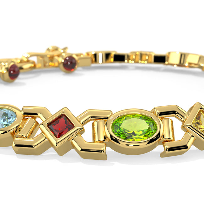 Gold bracelet with various colored gemstones on a white background