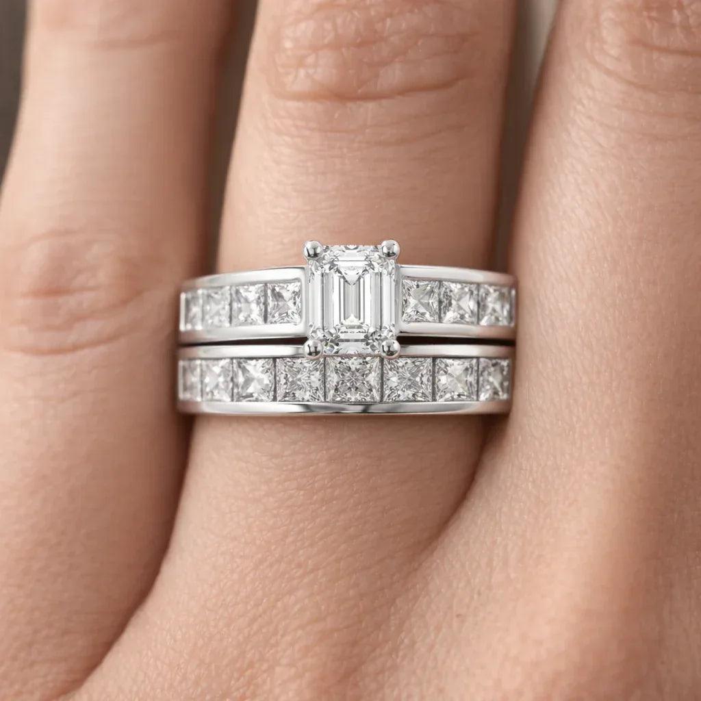 14k gold emerald cut diamond bridal set bands with sparkling diamonds, showcasing elegant wedding jewelry from JewelryNest.