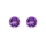 Pair of purple gemstone stud earrings on a white background