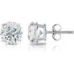 Diamond stud earrings on a white background