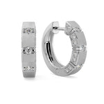 Gold hoop earrings with diamond accents on a white background