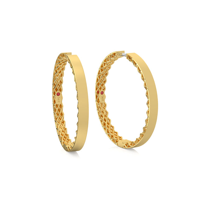 Gold hoop earrings with intricate design on a white background