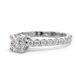 Diamond ring with a central gemstone and smaller stones on a white background