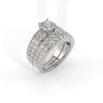 Gold bridal set rings with diamond accents on a white background