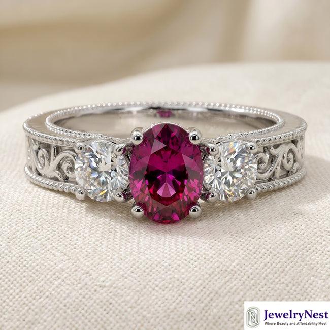 14K white gold oval ruby and diamond fashion ring with 1.50 total carats, featuring vibrant rubies and sparkling diamonds.