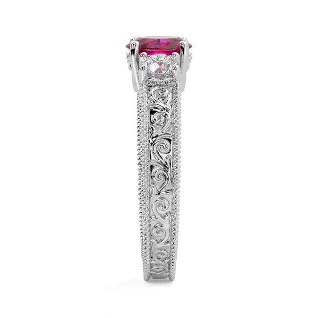 14K white gold oval ruby diamond fashion ring with 1.50 carats total weight, featuring vibrant ruby and sparkling diamonds.