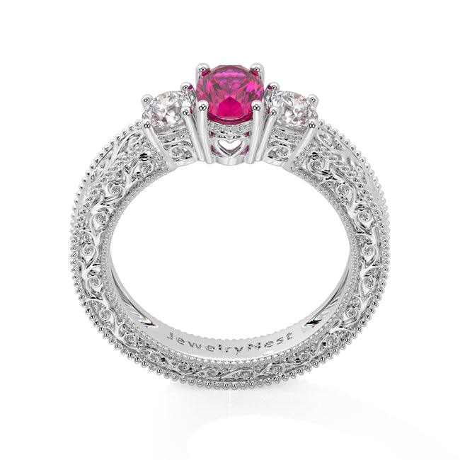 14K white gold oval ruby and diamond fashion ring with 1.50 carats total, showcasing vibrant red rubies and sparkling diamonds.