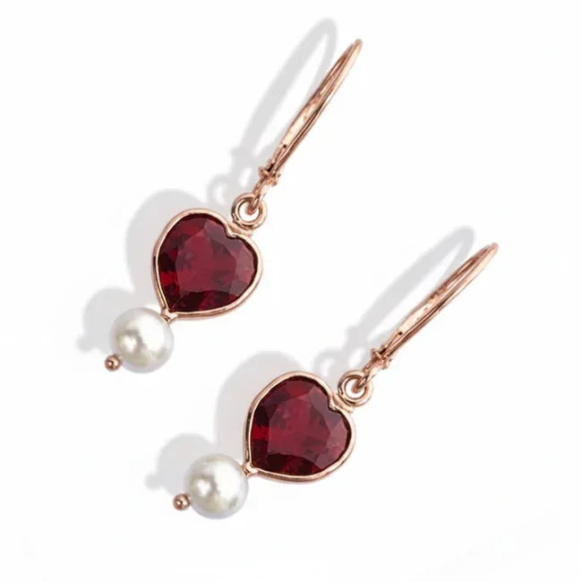 14k gold heart-shaped garnet pear dangle earrings with 3.0 cts.tw, featuring elegant drop design and sparkling red gemstones.