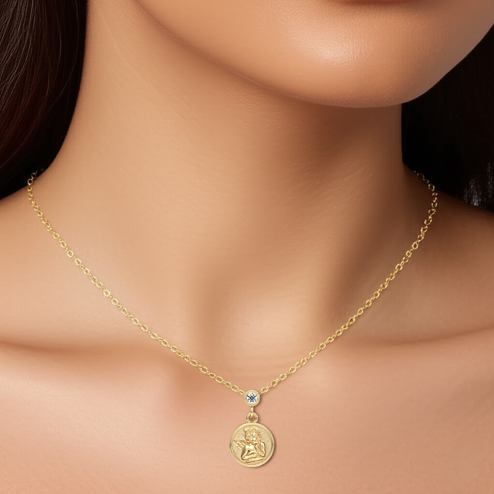 Gold necklace with a pendant on a model