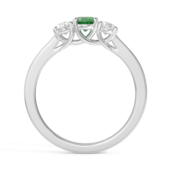 Silver ring with a green gemstone and diamond accents on a white background