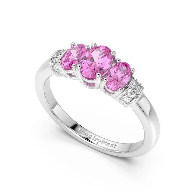 14k gold oval pink sapphire and diamond fashion ring with 1.14 carats total weight, featuring a elegant gemstone design.