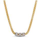 A gold chain necklace featuring three square bezel-set diamond accents at the center, displayed against a clean white background.