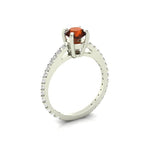 14k gold orange cognac solitaire diamond fashion ring with 0.65 carats tw, featuring a vibrant orange gemstone and elegant design