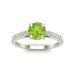 14k white gold fashion ring with a 0.65 ct ice green diamond solitaire, featuring a sleek and elegant design.