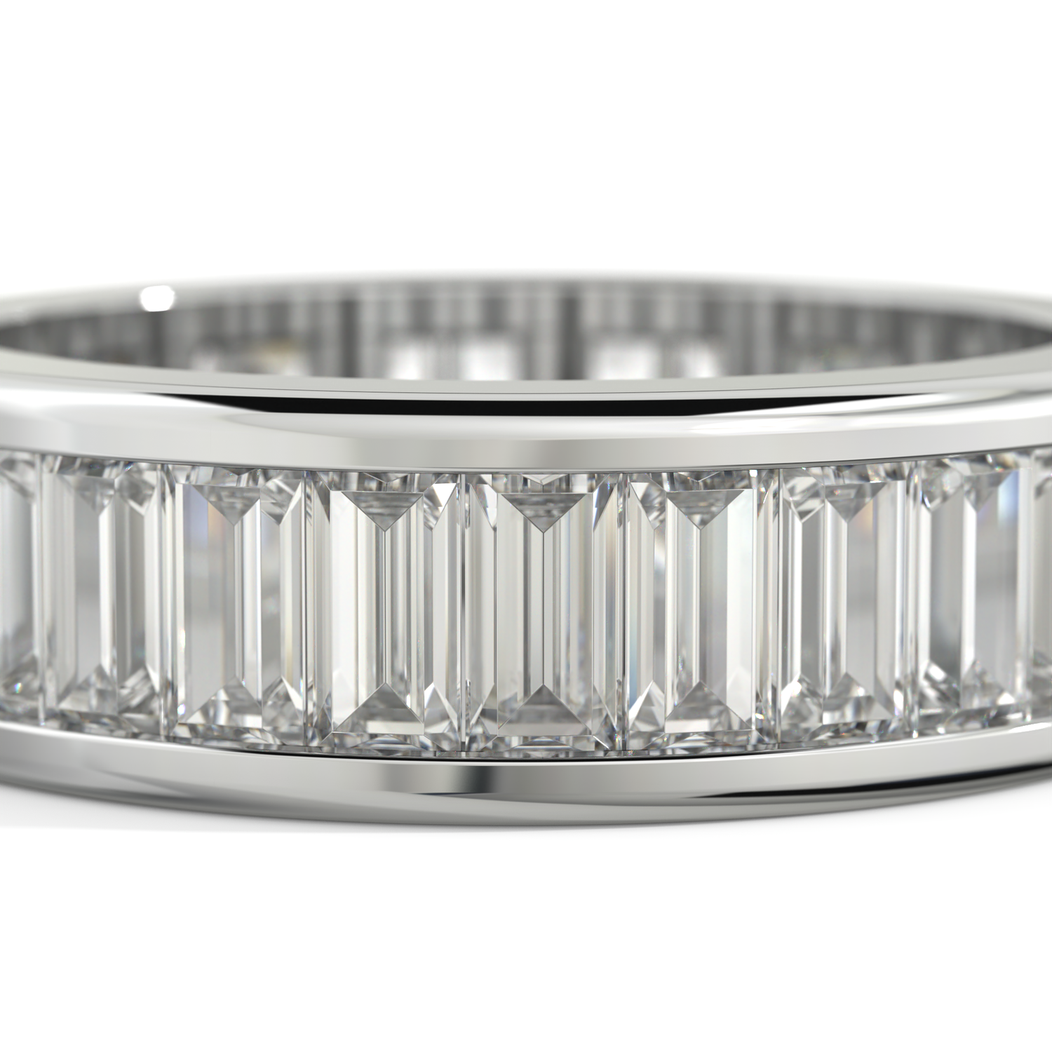 A close-up of a white-toned ring featuring a row of clear baguette-cut gemstones set in a polished band, shown against a white background.