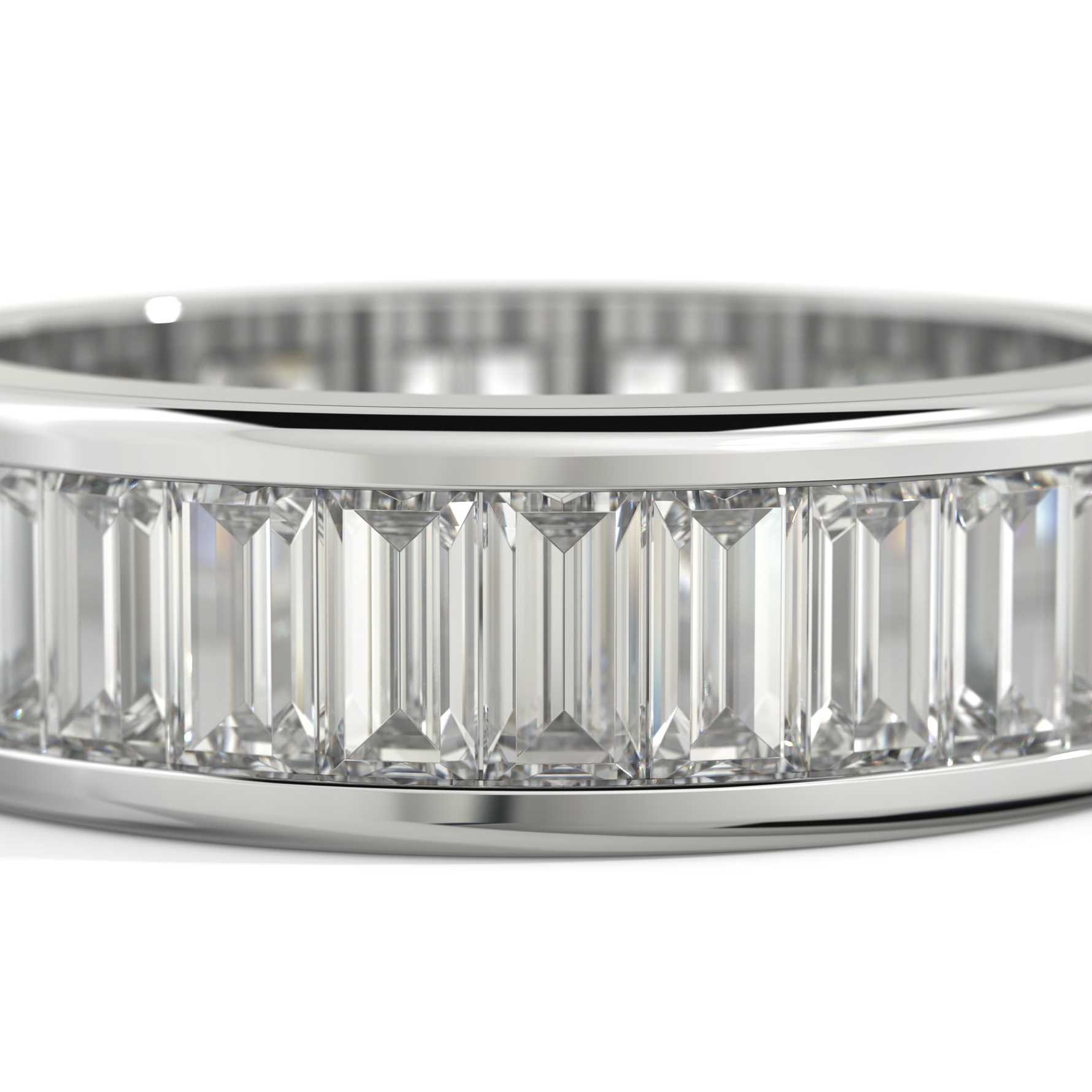 A close-up of a white-toned ring featuring a row of clear baguette-cut gemstones set in a polished band, shown against a white background.