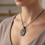 Black Gold Hamsa Diamond Necklace on Model