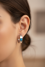 Blue Topaz Huggie Earrings on Model