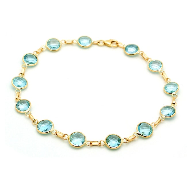 14k Yellow Swiss Blue Topaz Stationary Bracelet (16.25.cts.tw)