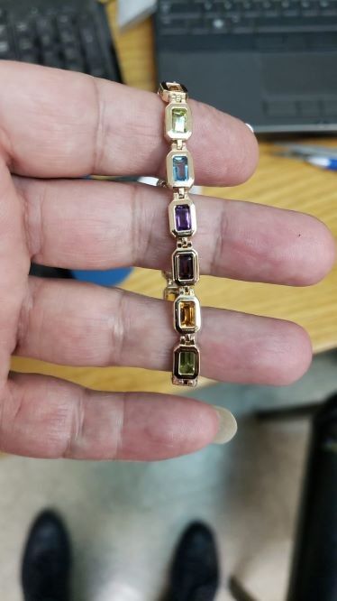 14k Gold Multi Color Emerald Cut Stone Bracelet On Background (6.73.cts.tw)