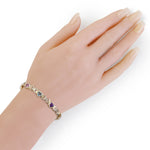 Yellow Gold Heart-Shaped Multi-Color Nine Stone Bracelet On Woman Hand (5.85 cts. tw)