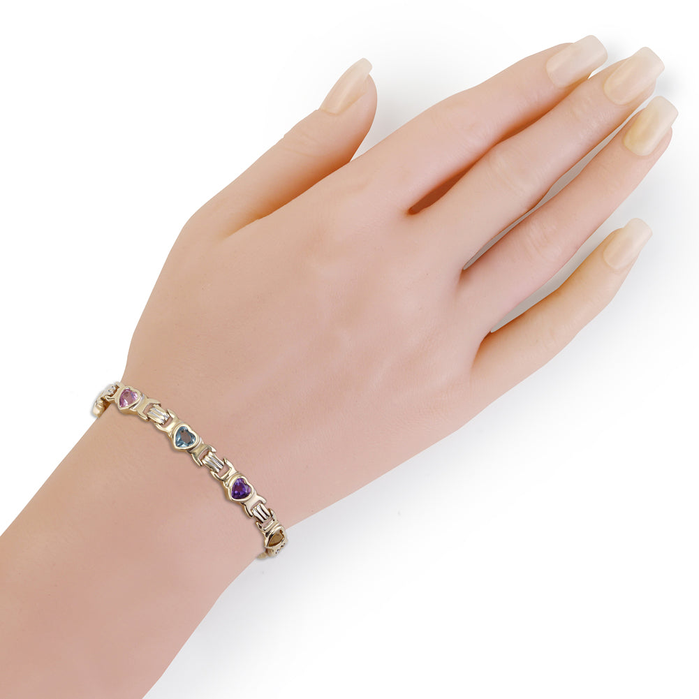 Yellow Gold Heart-Shaped Multi-Color Nine Stone Bracelet On Woman Hand (5.85 cts. tw)
