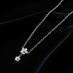 Daisy Necklace - White Gold Flat Lay