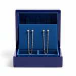 Diamond chain earrings in royal blue wooden box