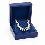 Diamond cluster crawler earrings in blue box