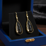 14k gold smoky topaz dangle earrings with diamonds, featuring elegant design and sparkling gemstones in a gift box.