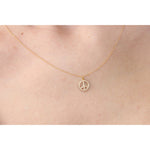 14k Yellow Gold Diamond Peace Sign Necklace On Woman Neck (0.25.ct.tw)