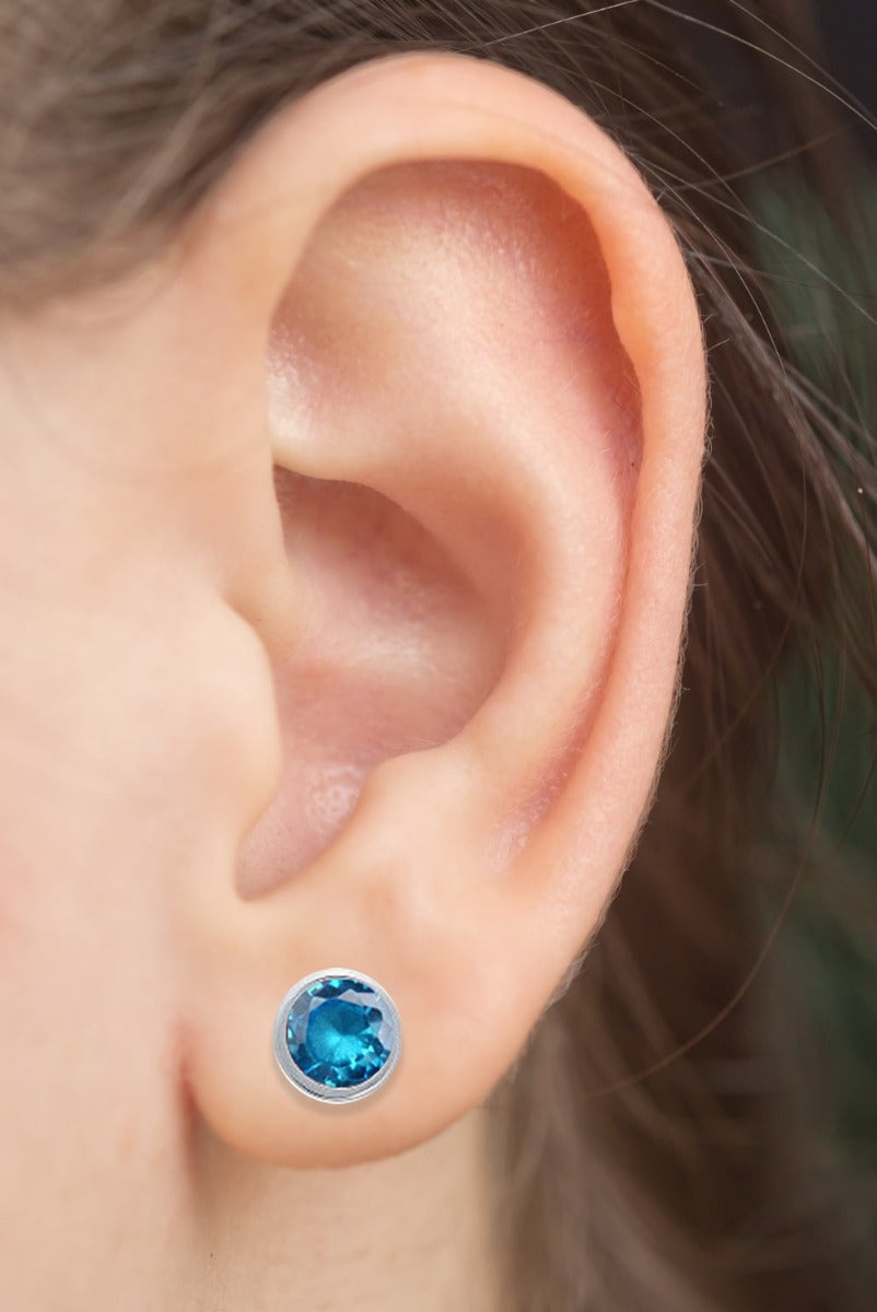 Sterling Silver Swiss Blue Topaz Bezel Stud Earring On Woman Ear (2.0.cts.tw)