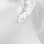 14K Diamond Star Climber Earrings On Woman Ear (0.30.ct.tw)