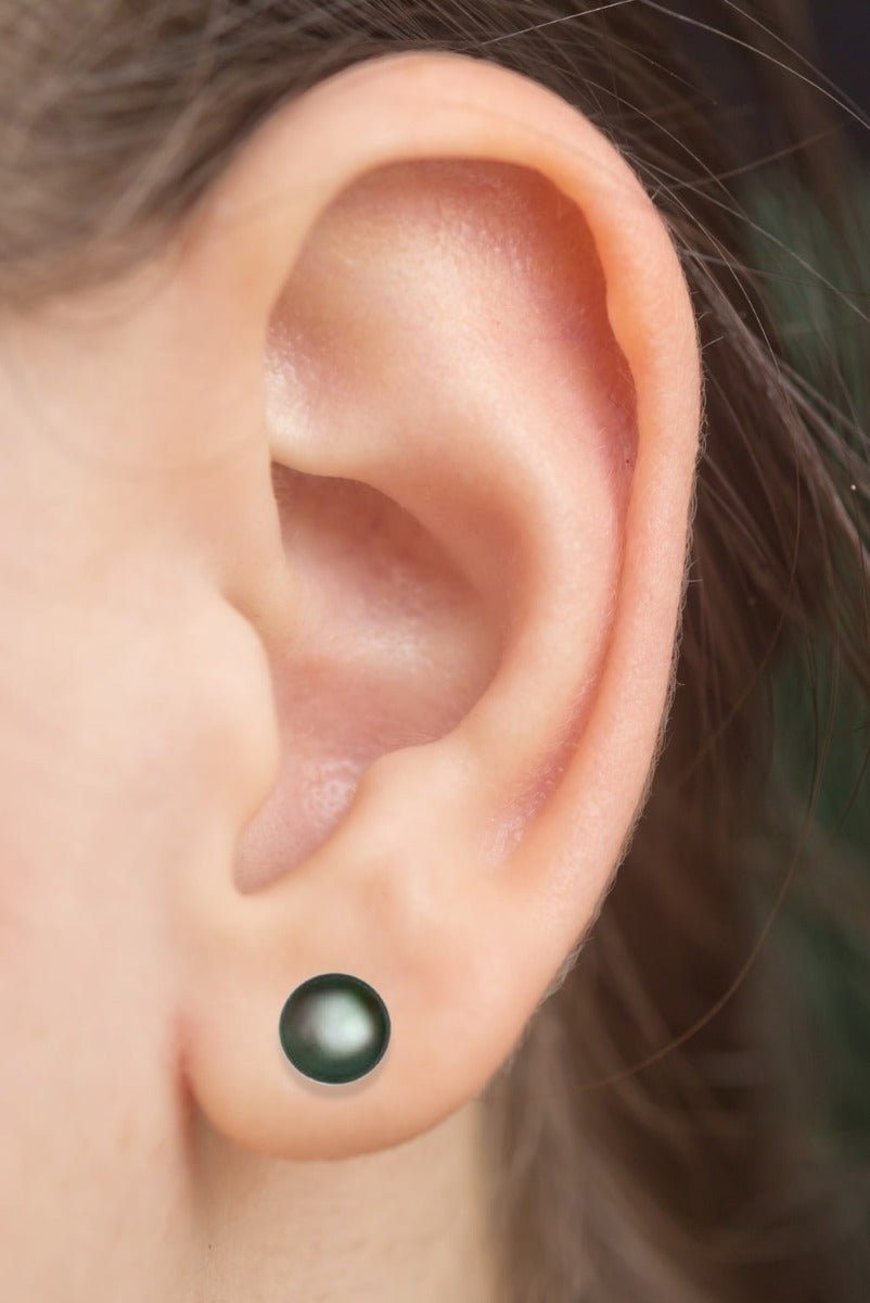 14k Gold Cultured Fresh Water Pearl Stud Earring  On Woman Ear (5.0 mm)