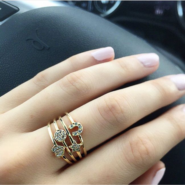 14k Heart-Shaped Solitaire Round Diamond Ring On Woman Hand (0.08.ct.tw)