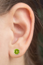 Sterling Silver Peridot Straight Bezel Stud Earring On Woman Ear (2.0.cts.tw)
