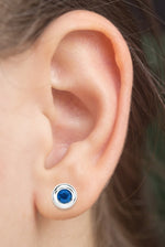 14k Gold Round Sapphire Bezel Earrings Stud On Woman Ear (0.50.ct.tw)