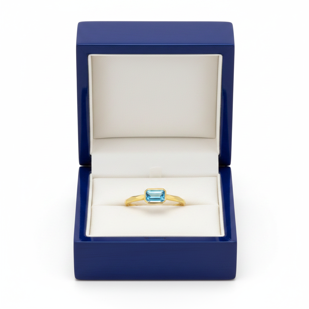 14k gold octagon geometric solitaire ring with 0.20 ct tw diamond, displayed in a royal blue wooden box.