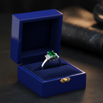 14k gold three-stone green emerald and diamond fashion ring in a gift box featuring 1.60 cts total weight.