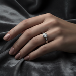 14k white gold round bezel solitaire diamond ring worn on hand