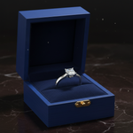 14k white gold Asscher-cut diamond solitaire ring in royal blue wooden jewelry box