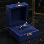 14k gold emerald green solitaire diamond fashion ring with 0.90 ct total weight, featuring a striking green gemstone.
