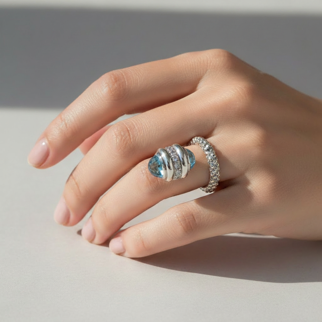 Blue Topaz Popcorn Diamond Ring worn on model's hand
