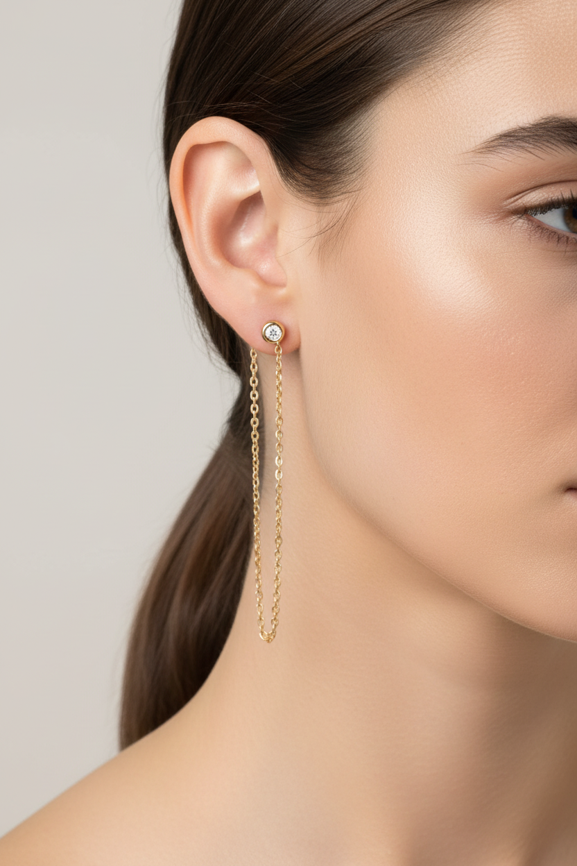 Model wearing diamond chain earrings