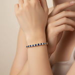 Model wearing oval sapphire diamond tennis bracelet